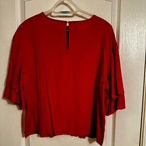 Red shirt with fun ruffle sleeves. Popsugar brand from Kohl’s